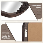 Grand miroir de sol en bois massif à encadrement incurvé et décorations sculptées