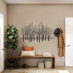 Décoration murale en métal noir représentant un champ d'arbres