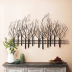 Décoration murale en métal noir représentant un champ d'arbres