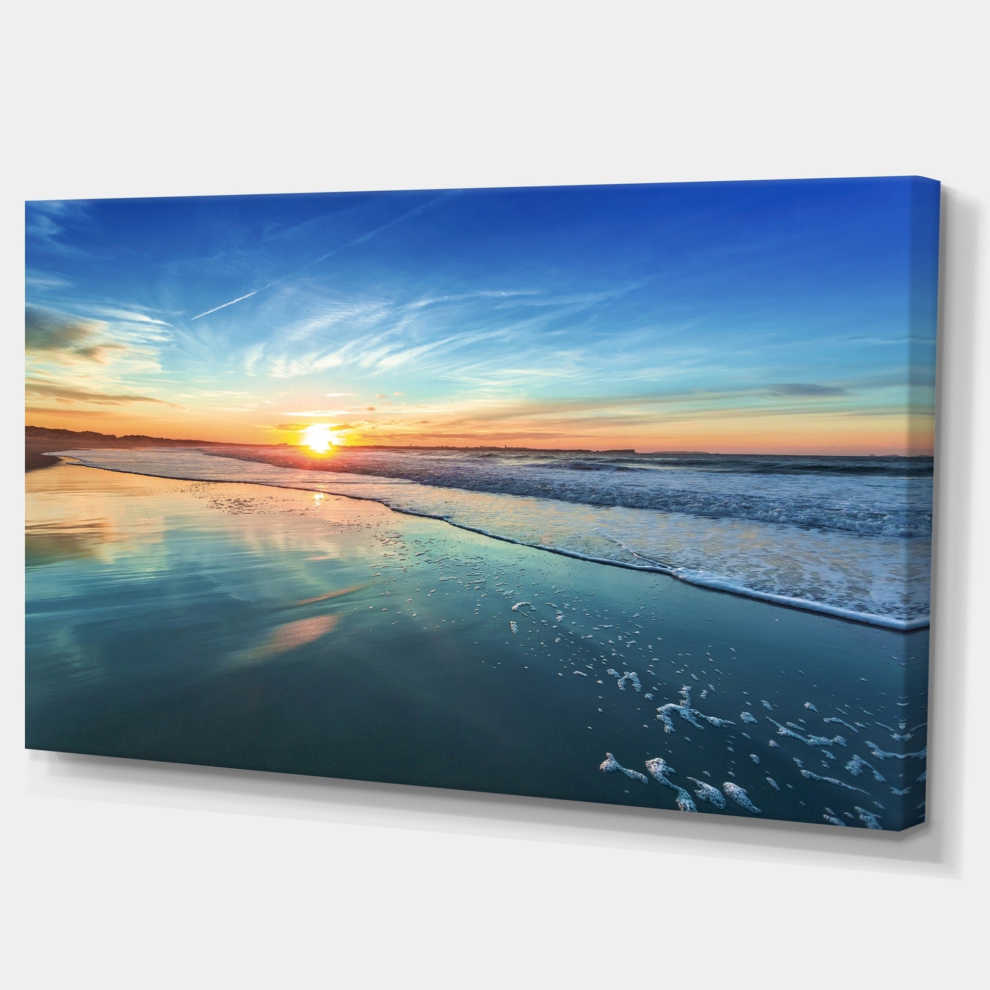 Cœur de plage bleu avec coucher de soleil lointain - Tableau sur toile représentant un bord de mer