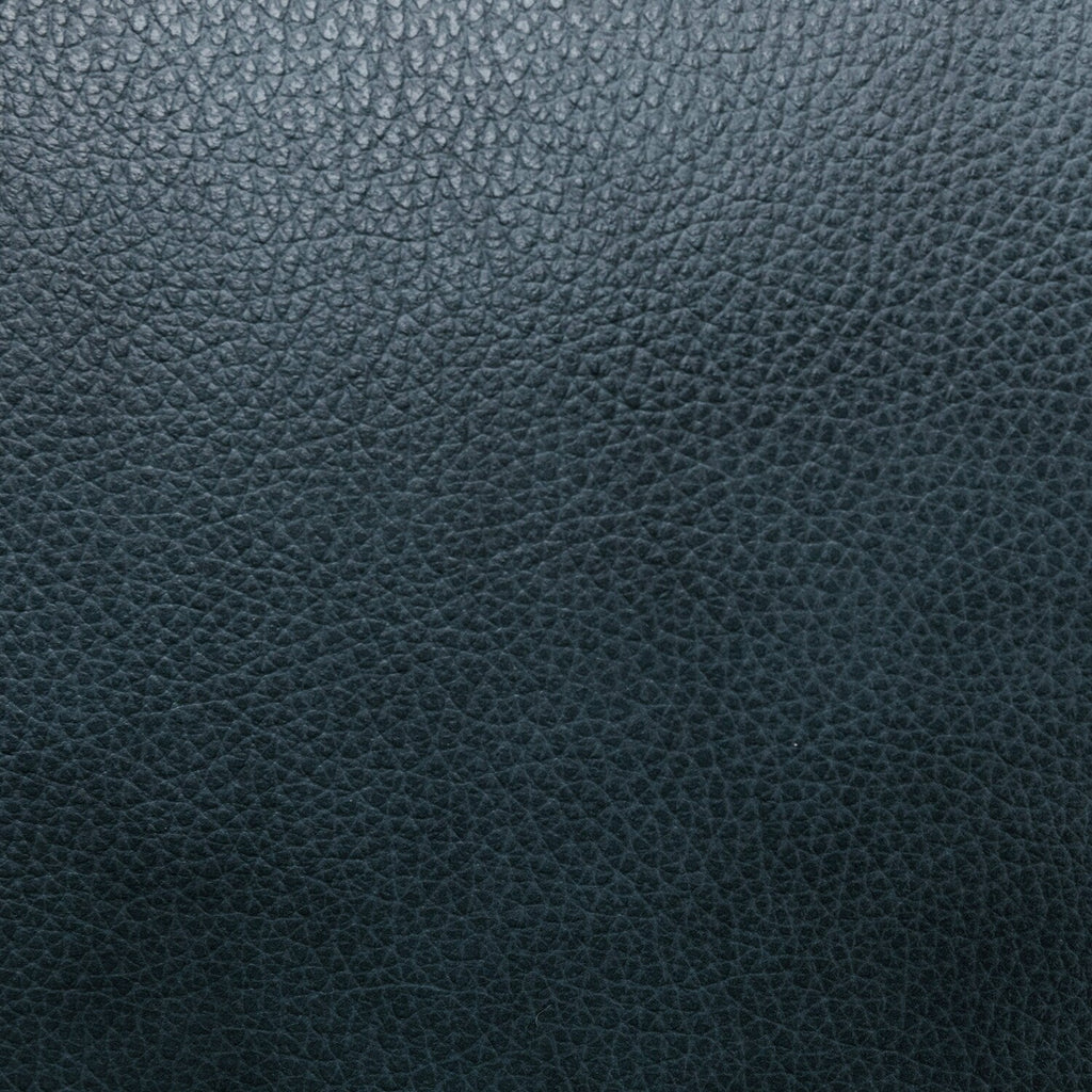 Fauteuil inclinable en cuir véritable avec dossier inclinable, accoudoirs et dossier confortables.