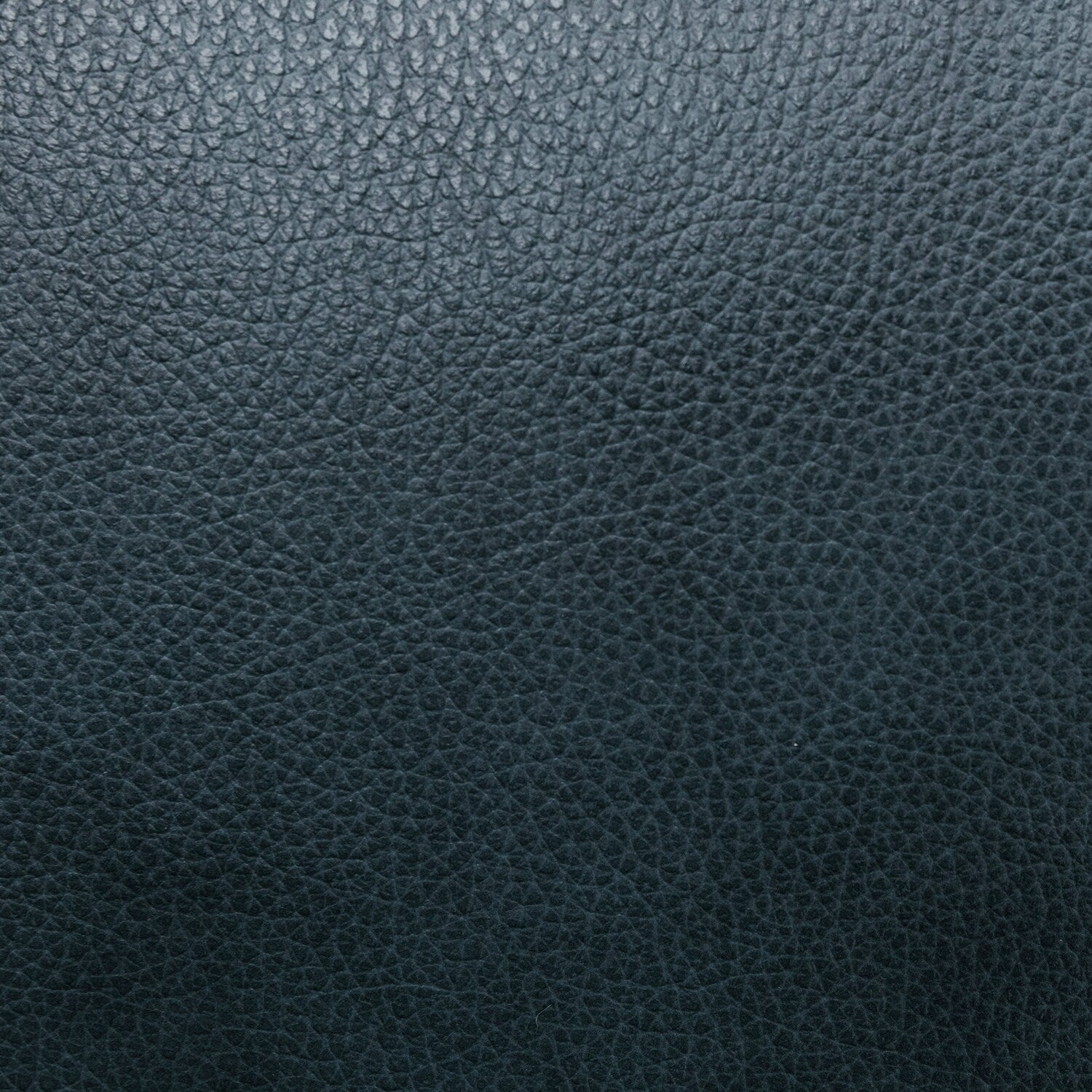 Fauteuil inclinable en cuir véritable avec dossier inclinable, accoudoirs et dossier confortables.