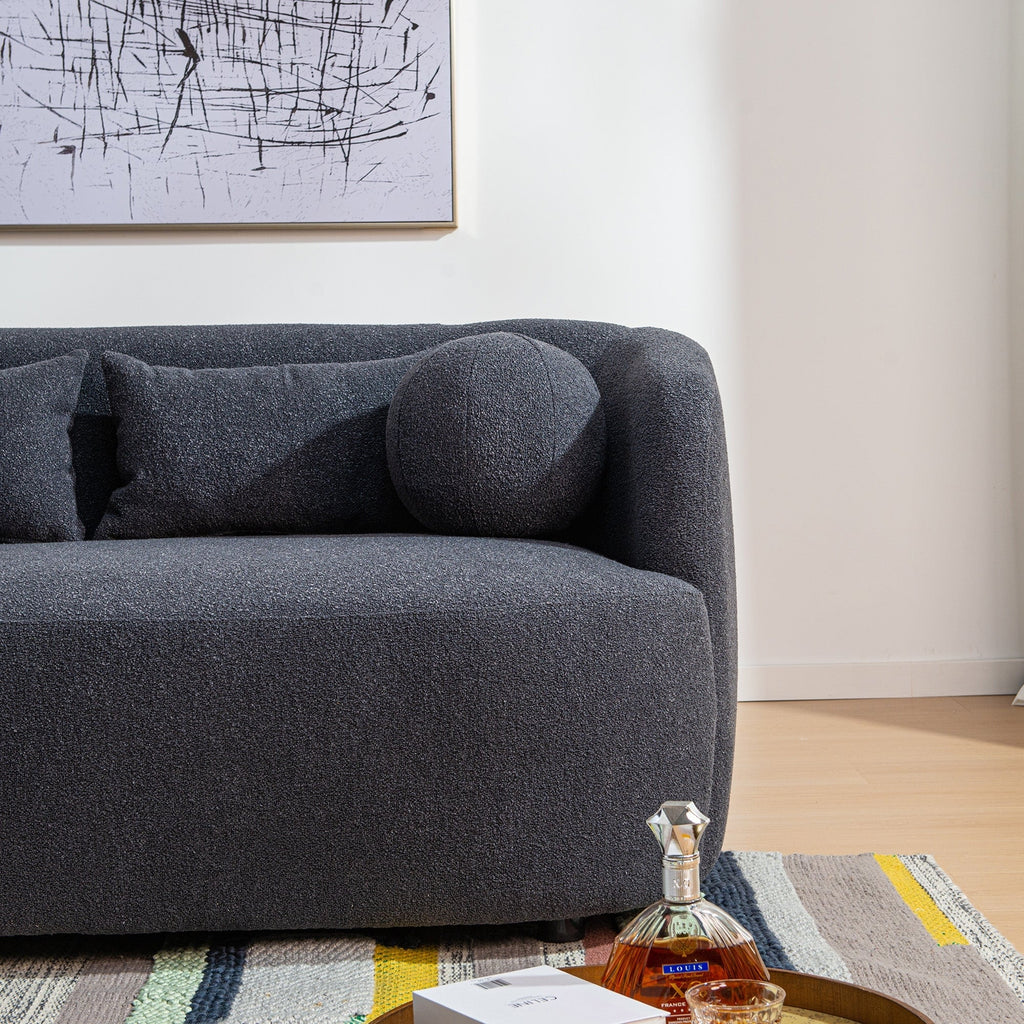 Canapé 2 places KINWELL en tissu bouclé avec coussins