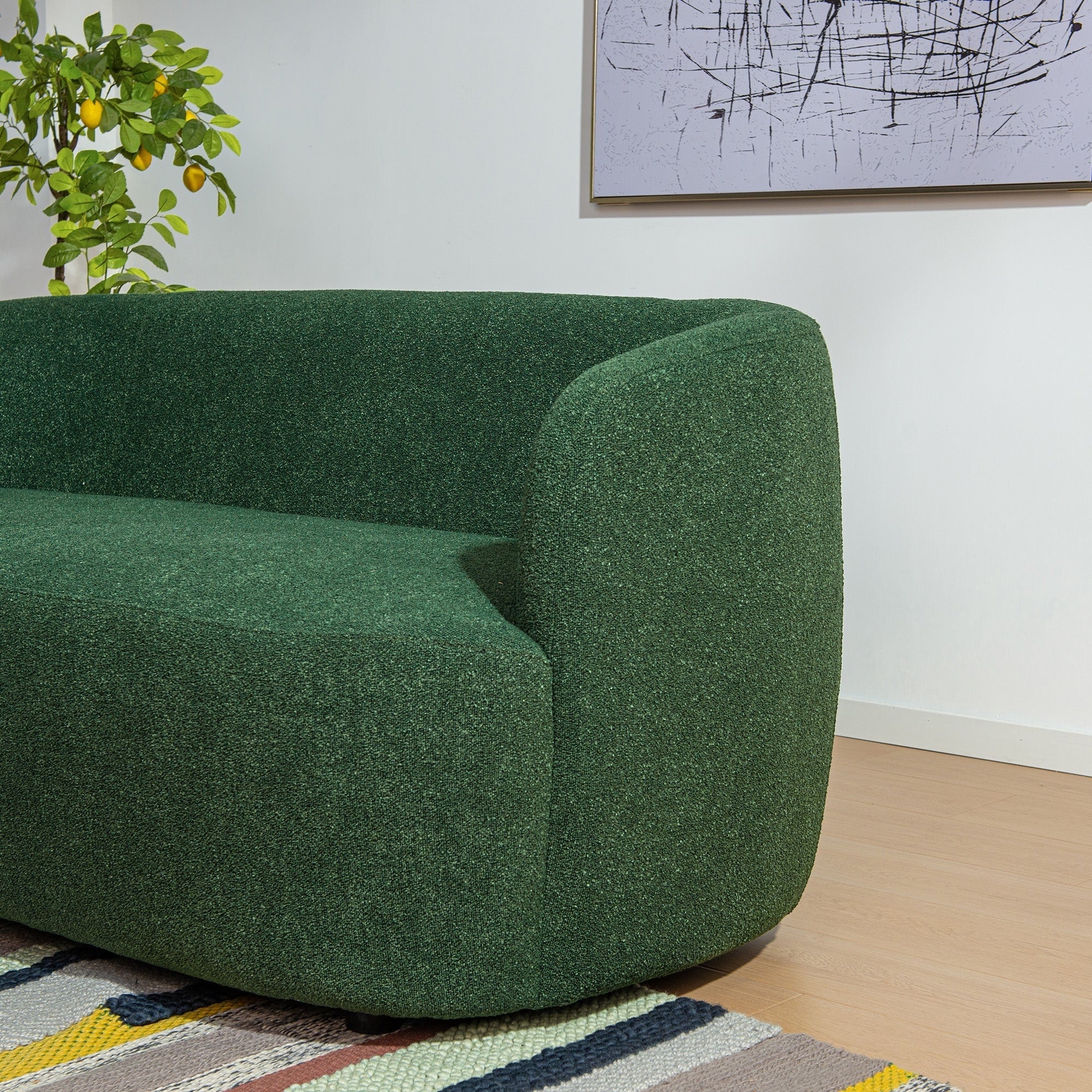 Canapé 2 places KINWELL en tissu bouclé avec coussins