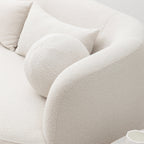 Canapé 2 places KINWELL en tissu bouclé avec coussins