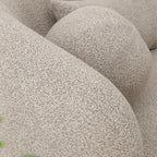 Canapé 2 places KINWELL en tissu bouclé avec coussins