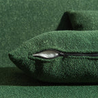 Canapé 2 places KINWELL en tissu bouclé avec coussins