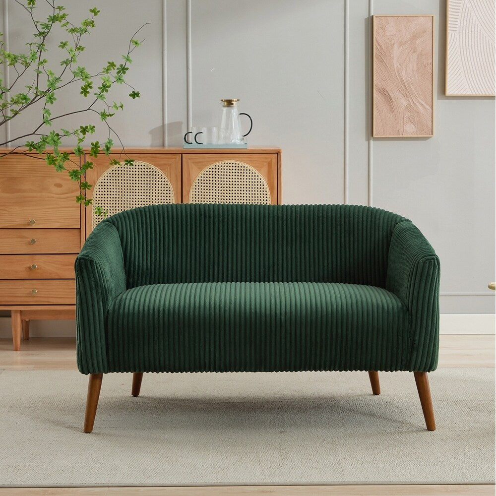 Canapé 2 places recouvert de tissu velours côtelé avec pieds en noyer