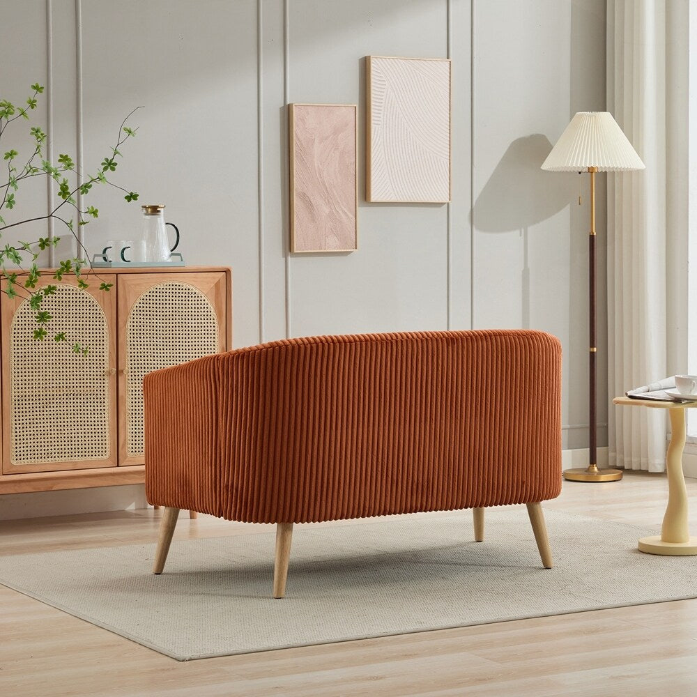 Canapé 2 places recouvert de tissu velours côtelé avec pieds en noyer