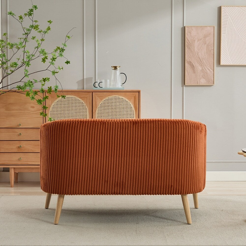 Canapé 2 places recouvert de tissu velours côtelé avec pieds en noyer