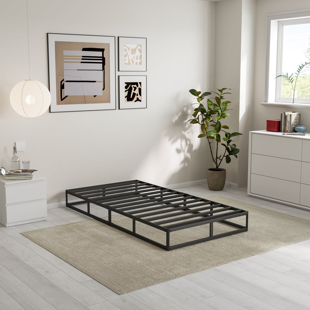 Ressort métallique à profil bas de 5 pouces, structure robuste avec revêtement gris.