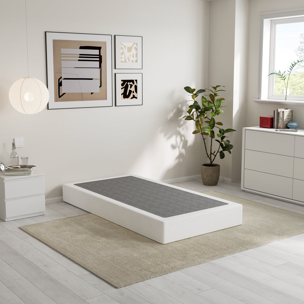 Ressort métallique à profil bas de 5 pouces, structure robuste avec revêtement gris.