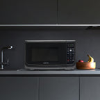 Four à micro-ondes de comptoir Farberware de 1000 watts et 1,1 pi³ avec éclairage LED et verrouillage enfant.