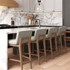 Tabouret de bar moderne Gracie, chaise rembourrée en bouclette et pieds en bois brossé