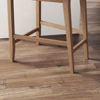 Tabouret de bar moderne Gracie, chaise rembourrée en bouclette et pieds en bois brossé