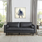 Canapé moderne en cuir véritable avec pieds en bois et coussin supplémentaire.