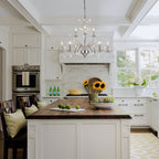 Luminaire suspendu en forme de branche d'arbre rétro style ferme avec lustre en cristal et bougie.