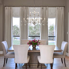 Luminaire suspendu en forme de branche d'arbre rétro style ferme avec lustre en cristal et bougie.