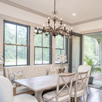 Luminaire suspendu en forme de branche d'arbre rétro style ferme avec lustre en cristal et bougie.