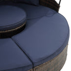Lit de jour rond en rotin d'extérieur avec auvent et table basse relevable, canapé-lit bleu marine à assise profonde avec oreillers et coussins lavables