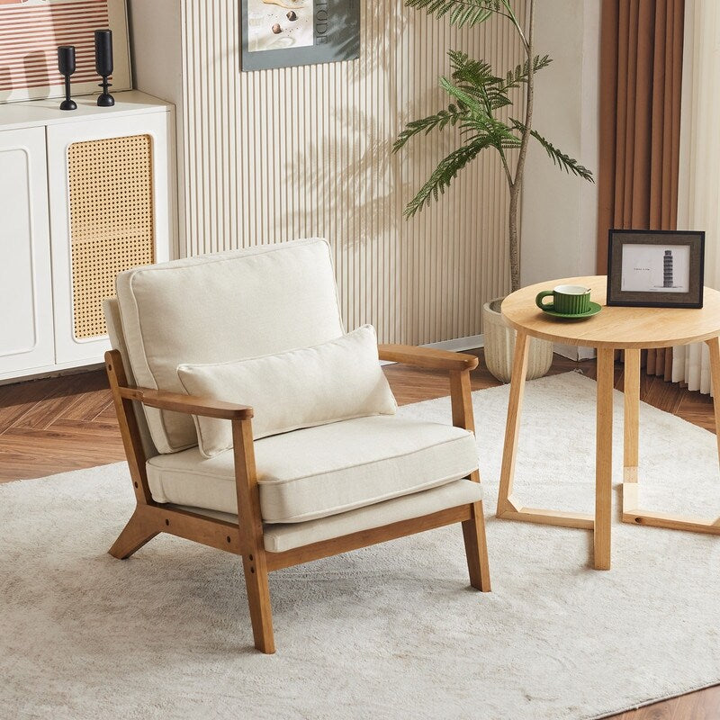 Fauteuil d'appoint en tissu mélangé de lin avec pieds en bois et un coussin beige.