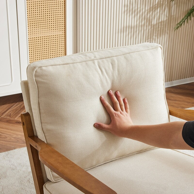 Fauteuil d'appoint en tissu mélangé de lin avec pieds en bois et un coussin beige.